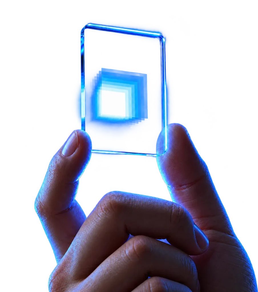 Hand holding a glowing, transparent glass chip with a bright blue rectangular visual effect, tagged with dhumi.